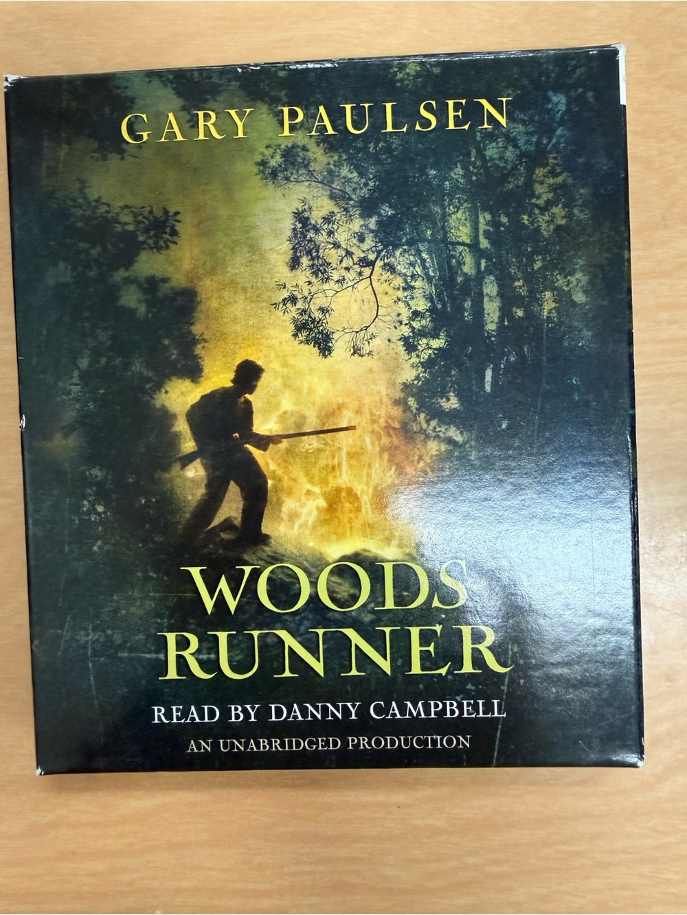Woods Runner Audiobook - Green and Black Cover by Gary Paulsen